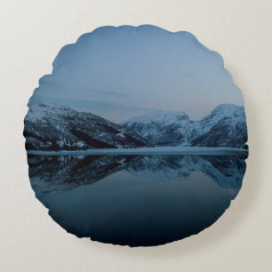 LAKE SURROUNDED BY MOUNTAINS ROUND PILLOW