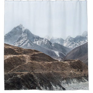 LANDSCAPE PHOTO OF MOUNTAINS UNDER WHITE CLOUDS