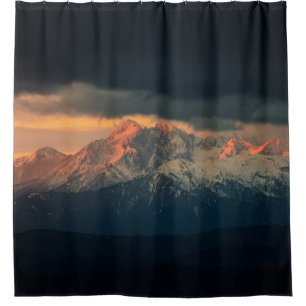 LANDSCAPE PHOTOGRAPHY OF SNOW MOUNTAINS UNDER NIMB