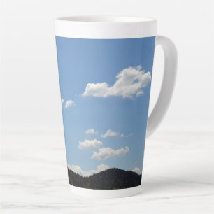 Landscape with green hills, trees & clouds latte mug