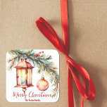 Lantern with Pine and Holly Berries Christmas Square Sticker<br><div class="desc">This customizable Christmas sticker features a charming watercolor design that beautifully captures the holiday spirit. At the centre, an antique-style lantern emits a warm, inviting glow, creating a cozy atmosphere. The lantern is adorned with a sprig of pine and delicate holly berries, adding a touch of natural elegance. The text...</div>
