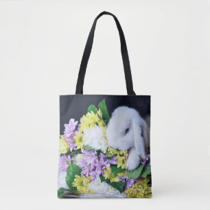 LAPIN AVEC LE SAC FOURRE-TOUT À FLEURS