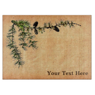 Larch Branch On Old Paper Cutting Board
