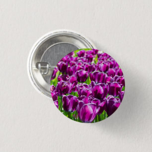 Large field of purple tulips  1 inch round button
