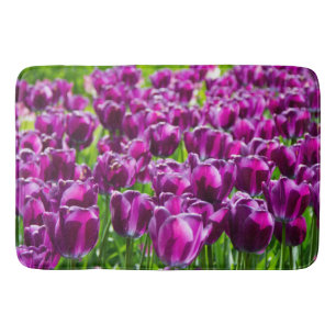 Large field of purple tulips    bath mat