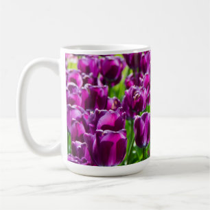 Large field of purple tulips    coffee mug