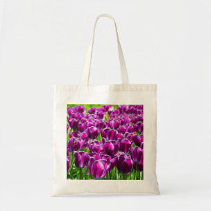 Large field of purple tulips   tote bag