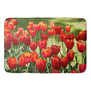 Large field of red tulips bath mat