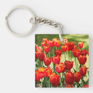 Large field of red tulips keychain