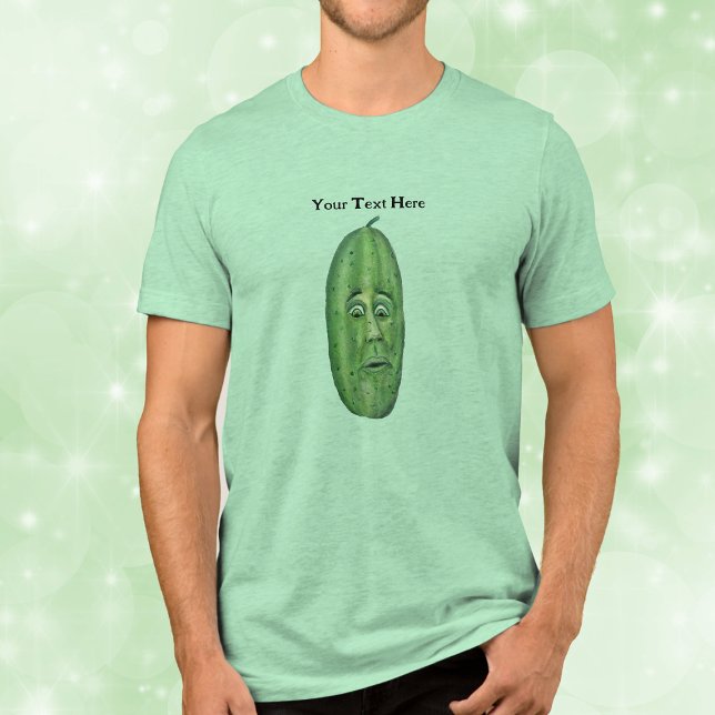 Large Green Pickle With Surprised Looking Face Tri-Blend Shirt (Silly looking face green eyes on big green pickle with a stem on men's tee shirt.)