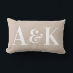 Large Monogram Initials on Solid Colour Lumbar Pillow<br><div class="desc">This simple and stylish throw pillow features a solid colour soft beige background with large monogram initials. You can personalize the pillow to include your own custom initials or text. It's perfect for representing a newlywed couple,  children,  or a family.</div>