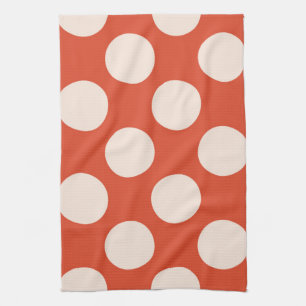 Large pink polka dots circles on red kitchen towel