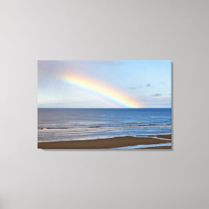 Large rainbow over the Pacific Ocean at Canvas Print