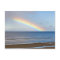 Large rainbow over the Pacific Ocean at