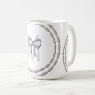 L'argent magique mignon cintre la tasse de baby