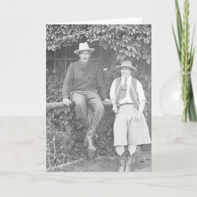 Larry Larom and a women posing. Card (Front)