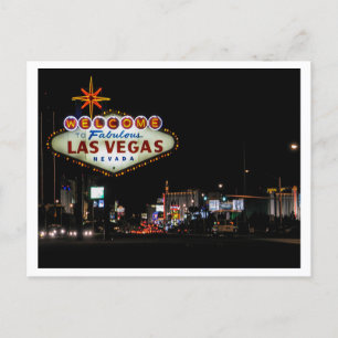Las Vegas night street scene with sign Postcard