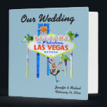 Las Vegas Wedding Album light blue Binder<br><div class="desc">Personalized Las Vegas Wedding album is a three ring binder which allows a couple to insert pages for photos. The famous welcome sign,  fun showgirl art,  and a pretty light blue background.</div>