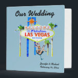 Las Vegas Wedding Album light blue Binder<br><div class="desc">Personalized Las Vegas Wedding album is a three ring binder which allows a couple to insert pages for photos. The famous welcome sign,  fun showgirl art,  and a pretty light blue background.</div>