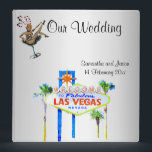 Las Vegas Wedding Album Silver Binder<br><div class="desc">Las Vegas photo album. Pretty silver background with the famous welcome sign and iconic showgirl art. A perfect wedding shower gift. Personalize with names of the newlyweds and date.</div>