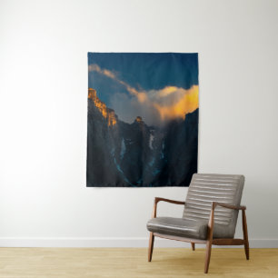 Last breath of sun shining on majestic mountains tapestry