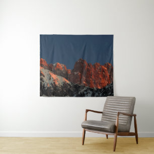 Last light of sun on mountains tapestry