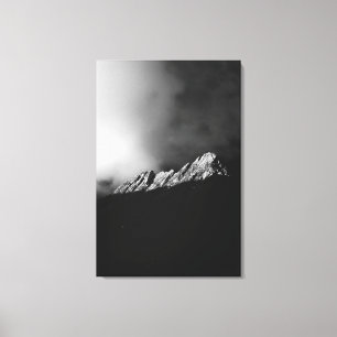 Last sun rays on the mountain in black and white canvas print