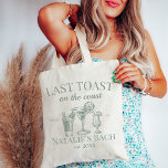 Last Toast On The Coast Beach Bachelorette Party Tote Bag<br><div class="desc">Capture the essence of coastal elegance with our Last Toast On The Coast Beach Bachelorette Party Tote Bag – the perfect blend of functionality and style for your beach bachelorette celebration. This tote bag goes beyond ordinary accessories; it's a symbol of personalized luxury, making it an ideal addition to your...</div>