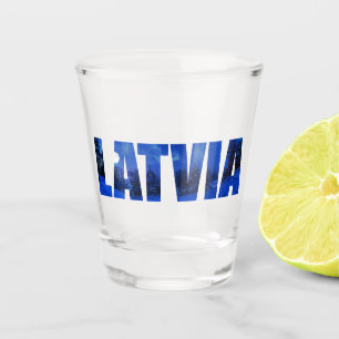 Latvia winter night text with reflection shot glass
