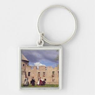 Latvian girls in traditional dress, singing keychain