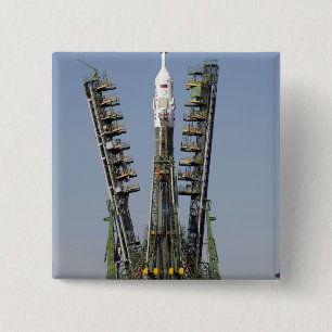 Launch scaffolding is raised into place 2 inch square button