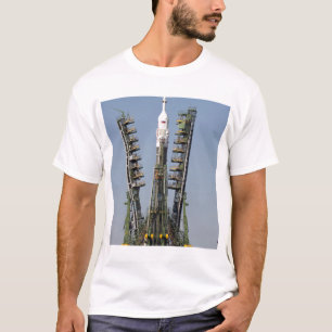 Launch scaffolding is raised into place T-Shirt