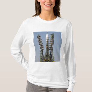 Launch scaffolding is raised into place T-Shirt