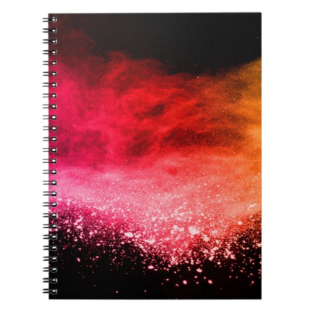 Launched colourful powder, isolated on black backg notebook (Front)