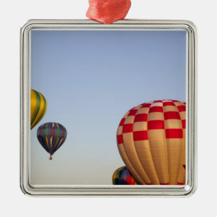 Launching hot air balloons 3 metal ornament
