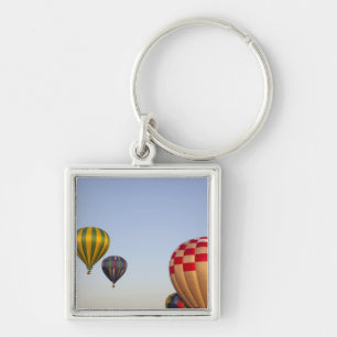Launching hot air balloons keychain