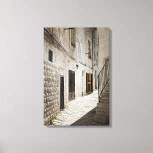 Laundry hanging to dry in an alley in Italy Canvas Print
