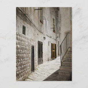Laundry hanging to dry in an alley in Italy Postcard