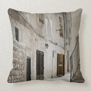 Laundry hanging to dry in an alley in Italy Throw Pillow
