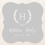 Laurel Crest Wedding Monogram | Grey Paper Coaster<br><div class="desc">Personalize the template with the bride and groom's names or monogram initials. Add your wedding date, the city, state or venue name or any other custom text. This modern rustic logo-style design has a laurel branch frame with your monogram initial. Use the design tools to choose any colours, edit the...</div>