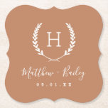 Laurel Crest Wedding Monogram | Terra Cotta Paper Coaster<br><div class="desc">Personalize the template with the bride and groom's names or monogram initials. Add your wedding date, the city, state or venue name or any other custom text. This modern rustic logo-style design has a laurel branch frame with your monogram initial. Use the design tools to choose any colours, edit the...</div>