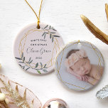 Laurel Leaf Baby's First Christmas Photo Ceramic Ornament<br><div class="desc">Celebrate your little one's first Christmas with this charming holiday ornament. Round design features "baby's first Christmas" along with baby's name and the year,  surrounded by a faux gold foil border accented with green winter leaves. Add a photo to the back with a matching golden geometric frame.</div>