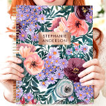 Lavender And Blush Wildflower Custom Name Planner<br><div class="desc">This beautiful design showcases a lush garden of wildflowers in shades of lavender, blush, burgundy, and peach, framed by soft greenery. The rose gold nameplate adds a personalized touch, creating an elegant and timeless look. Perfect for students, professionals, or anyone who appreciates romantic floral designs. Ideal for organizing tasks, journalling,...</div>