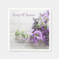 Lavender-coloured flowers on old music