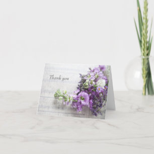 Lavender-coloured flowers on old music thank you card