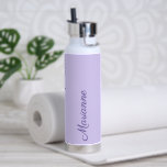 Lavender custom name script water bottle<br><div class="desc">Stay hydrated in style with this elegant lavender water bottle featuring a personalized name design. Crafted in a soft, modern lavender tone, this stainless steel bottle combines functionality with refined, feminine style. The sleek vertical name detail adds a custom touch, making it perfect for yoga classes, Pilates sessions, gym workouts,...</div>