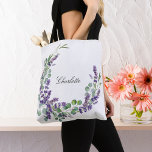 Lavender eucalyptus greenery floral name script tote bag<br><div class="desc">White background,  decorated with lavender flowers and eucalyptus greenery.
Personalize  and add your name. Black letters.</div>