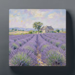 Lavender Fields Provence Cottage Impressionist Plaque<br><div class="desc">Serene lavender fields stretch endlessly toward a charming stone cottage under a dreamy Provençal sky. Soft brushstrokes in delicate purples,  gentle lavenders,  and warm golden light capture the peaceful,  romantic essence of the French countryside in timeless impressionist style.</div>