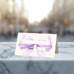 Lavender Ivory bow Place Cards Elegant Folded<br><div class="desc">A soft ivory colored background decorated with a large lavender colored bow. Perfect for birthday parties, baby shower, bridal showers, Confirmations and First Communions.</div>