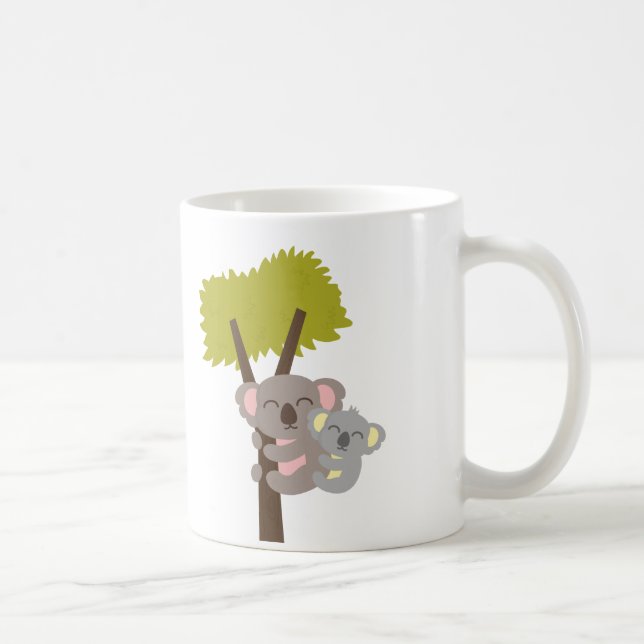 Le bébé étreint la tasse personnalisée d'ours de (Droite)